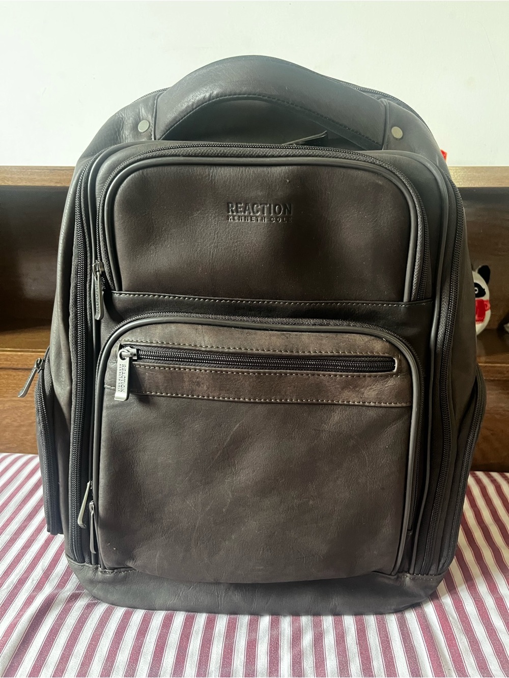 Kenneth Cole Reaction Dark Brown Leather Backpack with Multiple Front Pockets